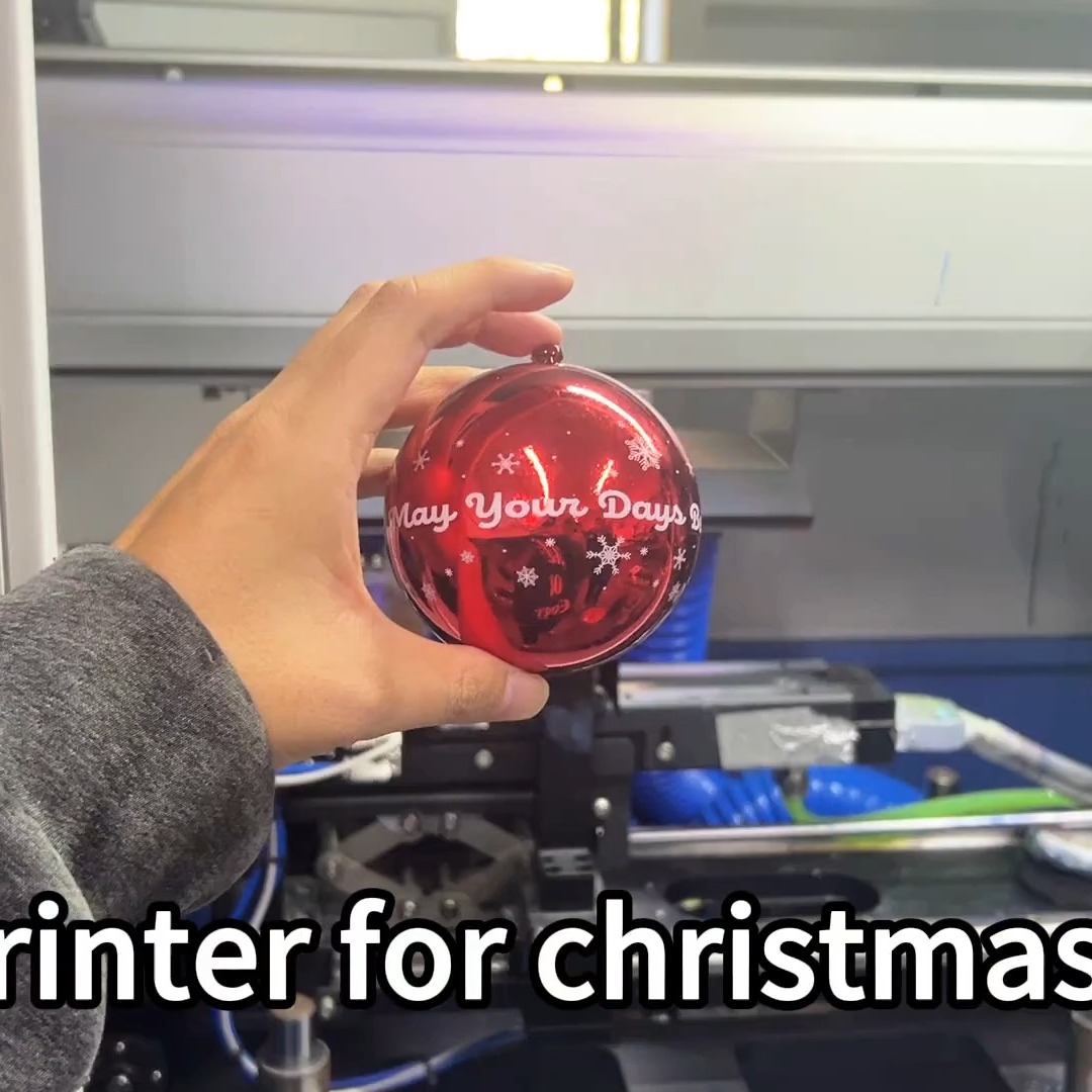 Red ornaments printed by Christmas Ball Printer